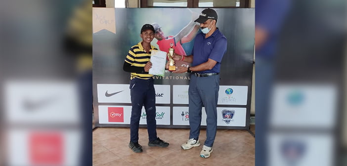 Tournament Director Ajay Kumar D (R) giving away prizes to the winners