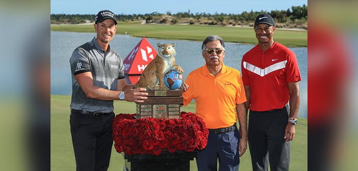 Henrik Stenson (L), Dr Pawan Munjal (CEO & President Hero MotoCorp) and Tiger Woods