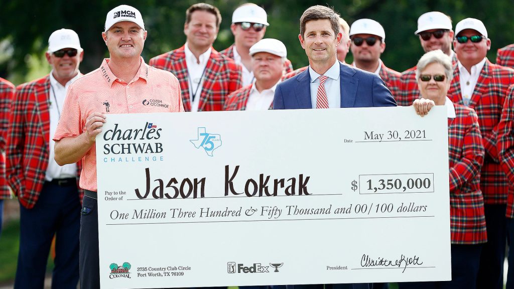 Jason Kokrak with his winning cheque in 2021